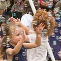 Children playing with bubbles